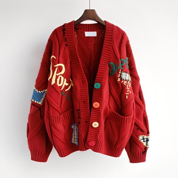 Lekki haftowany sweter damski z patchworkowym wzorem