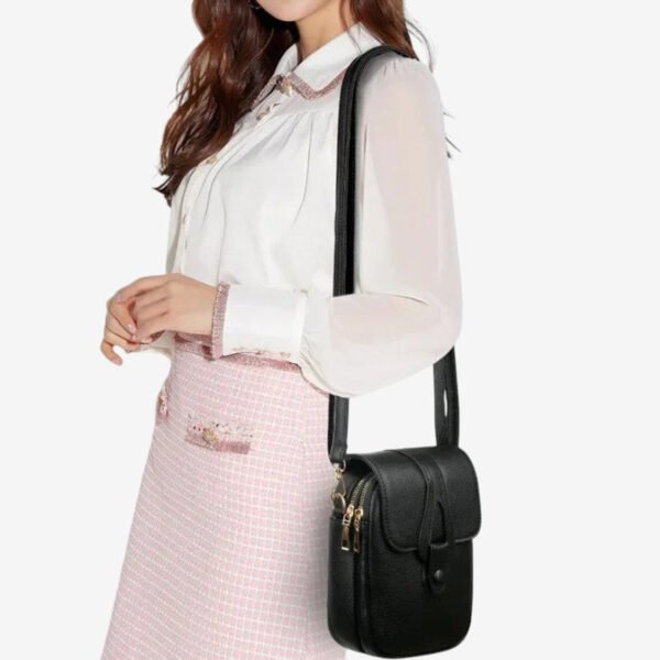 Torba crossbody z regulowanym paskiem i kieszeniami na zamek